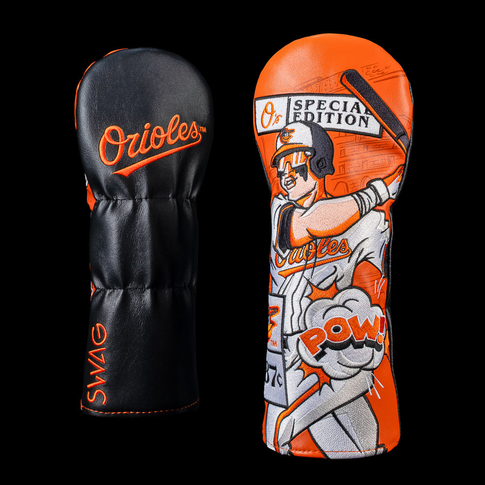 SWAG Golf Baltimore Orioles fairway  cover shown front and back with an embroidered Orioles script logo on the reverse and comic book artwork featuring an Orioles batter, "Special Edition" sign, price tag graphic, and POW! callout.