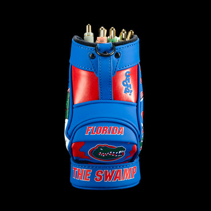 Front view of the Florida Gators Desk Caddy with blue outer panels, red center sections, Florida lettering, small alligator graphics, and “The Swamp” text along the base.