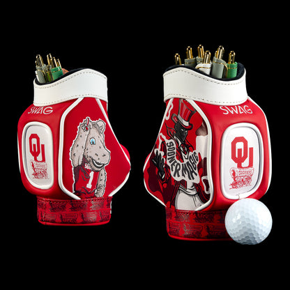 SWAG Golf Oklahoma Sooners Desk Caddy featuring crimson, white, and black artwork, OU logos, bold Oklahoma lettering, and illustrated graphics.