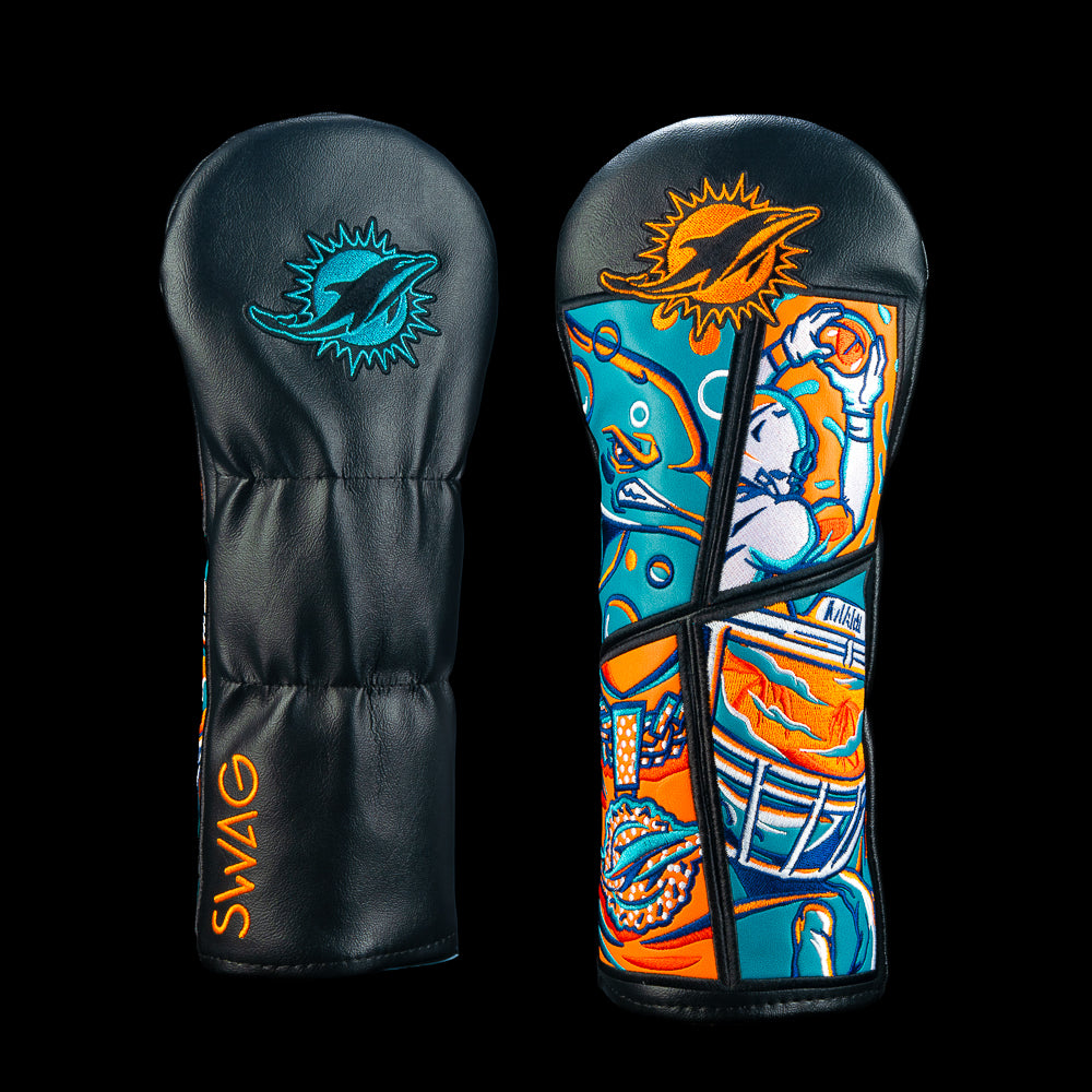 SWAG Golf NFL Miami Dolphins Fins Up Fairway Cover with illustrated dolphin breaking through aqua water, window artwork, and bright orange and white details.