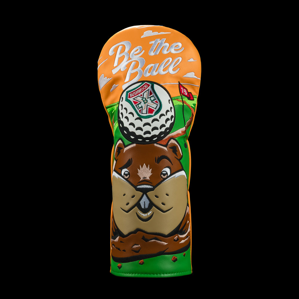 Rewind Golf Caddyshack Be the Ball driver headcover with gopher, golf ball and white lettering on an orange and green background and Be the Ball lettering above.