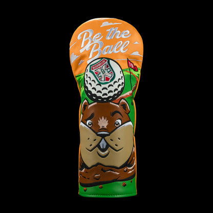 Rewind Golf Caddyshack Be the Ball driver headcover with gopher, golf ball and white lettering on an orange and green background and Be the Ball lettering above.