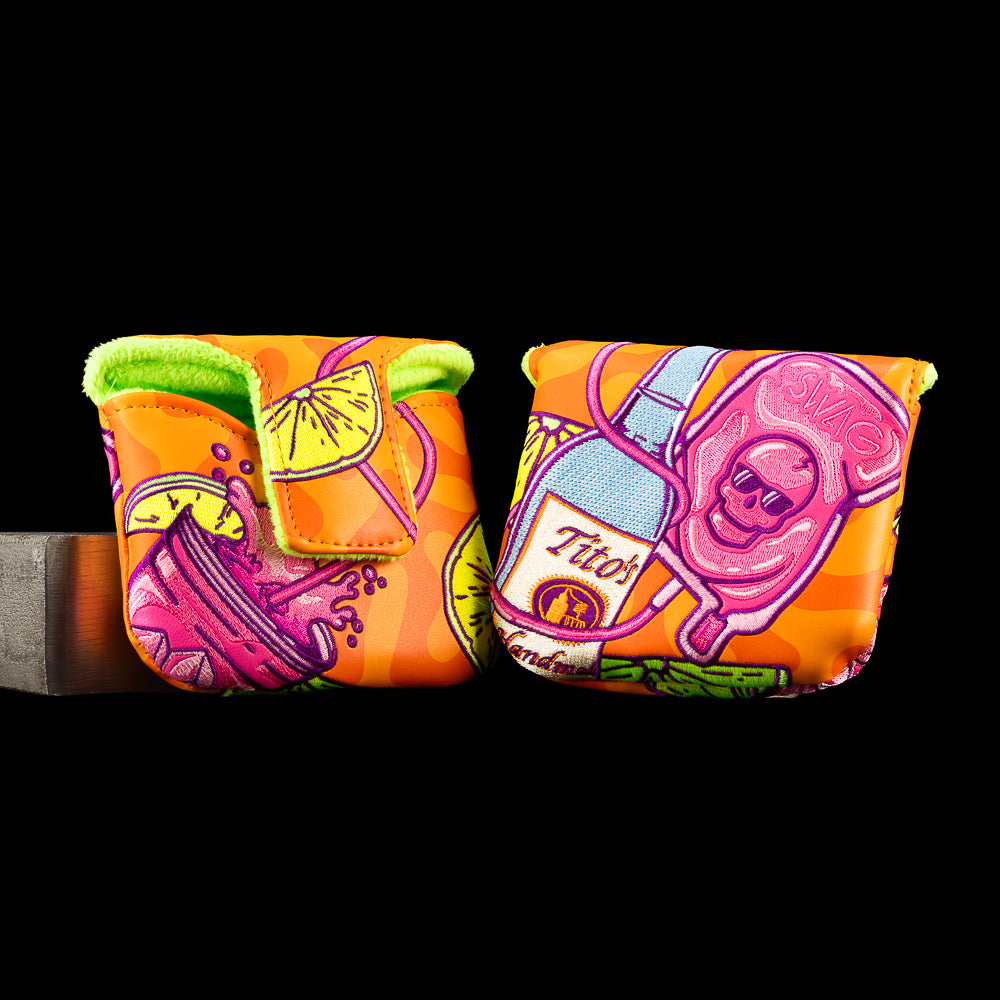 SWAG Golf Tito's Splash of Grape mallet putter cover featuring a Tito's Vodka bottle, purple grape cocktail, lime wedges, and citrus slices.