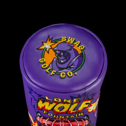 Top view of the Lone Wolf Barrel Driver Cover. Featuring a cartoon wolf wearing sunglasses with a lit firecracker and the phrase "SWAG GOLF CO." embroidered on the top.