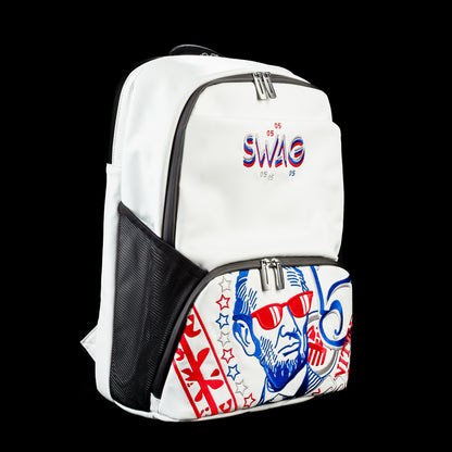 Angled side view of the RWB Gigantic Lincoln Backpack showing patriotic Lincoln graphics, black side panel, adjustable shoulder straps, and front storage pocket.