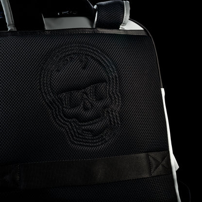 Close-up of the padded black back panel on the RWB Gigantic Lincoln Backpack featuring embossed skull artwork and textured detailing.