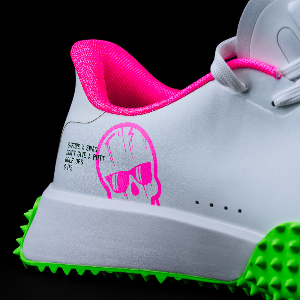 Swag x G/Fore G.112 Swagenta Skull men's white, pink, and green golf shoe.