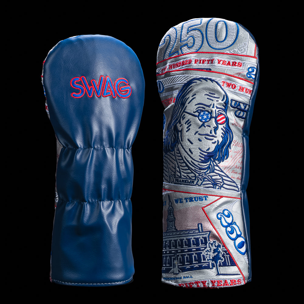 SWAG Golf $250 Franklin driver cover featuring oversized currency inspired graphics, Benjamin Franklin embroidery with patriotic sunglasses, Liberty Bell detailing, and bold red white and blue accents.
