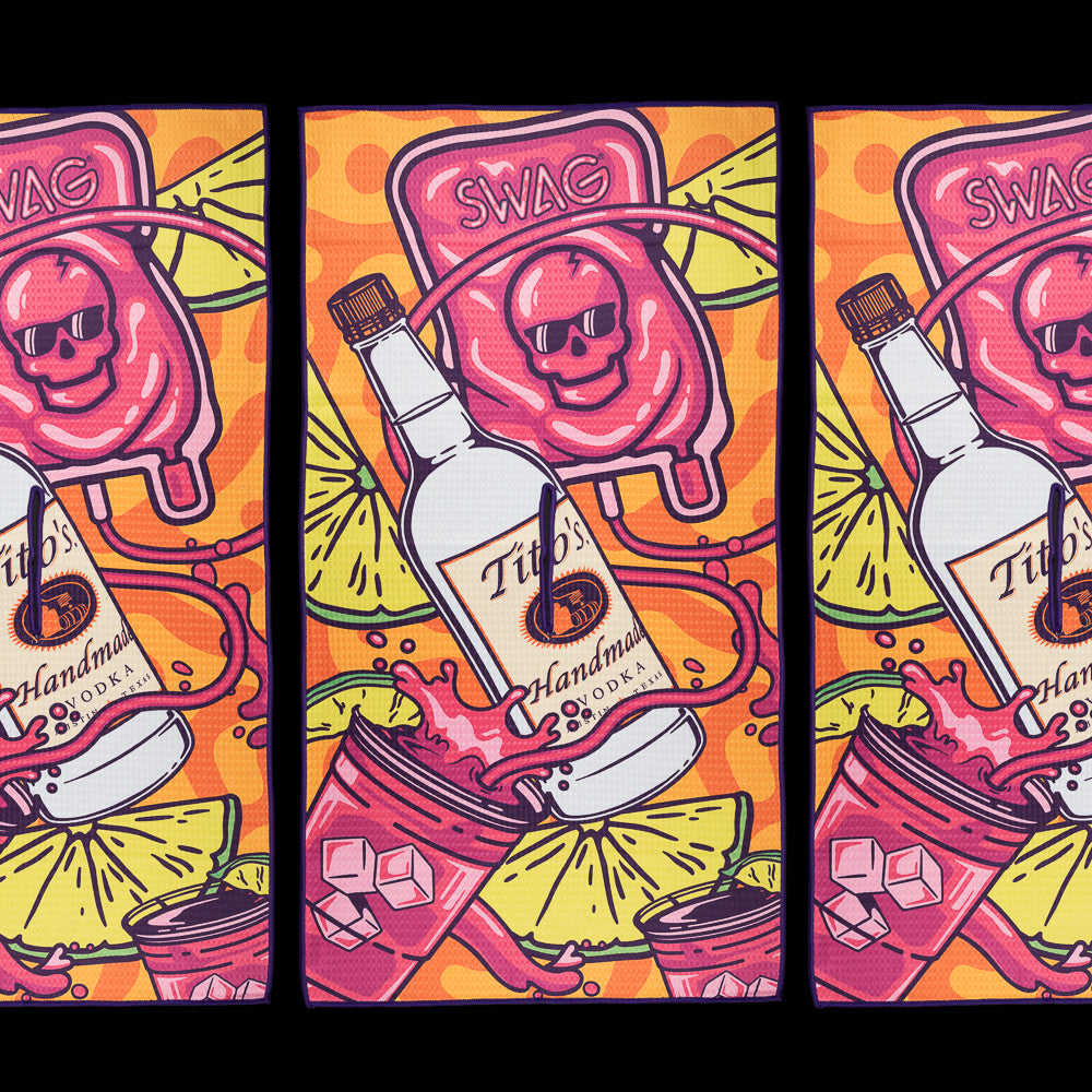 Tito's x SWAG mallet putter cover featuring purple grape artwork, Tito's bottle graphics, lime slices, and vibrant splash-inspired design.
