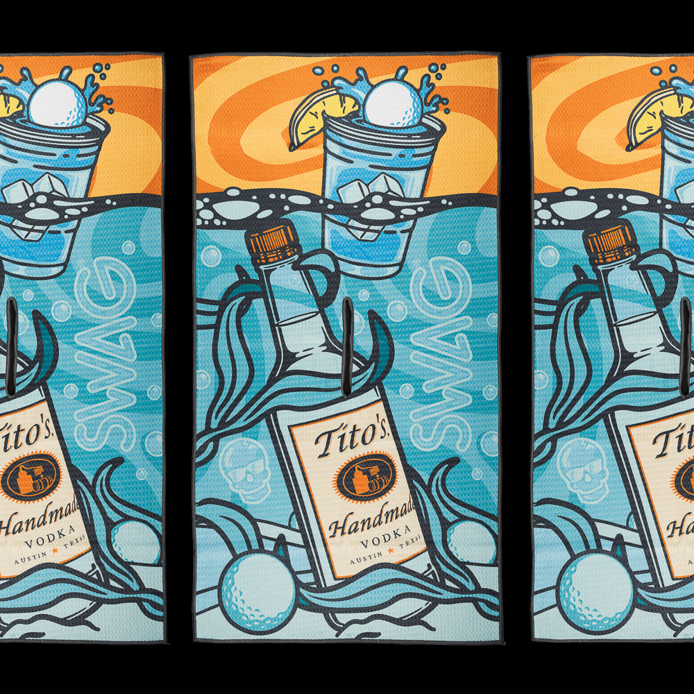 Tito's x SWAG golf towel featuring rolling wave artwork, floating ice, cocktail-inspired graphics, and water hazard illustrations.