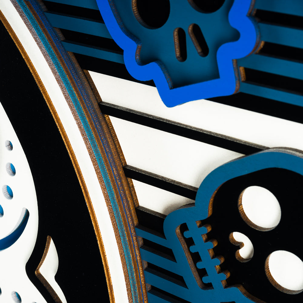 Swag x Andre Kaut wood art panel serape sugar skull themed in blue, white and black.
