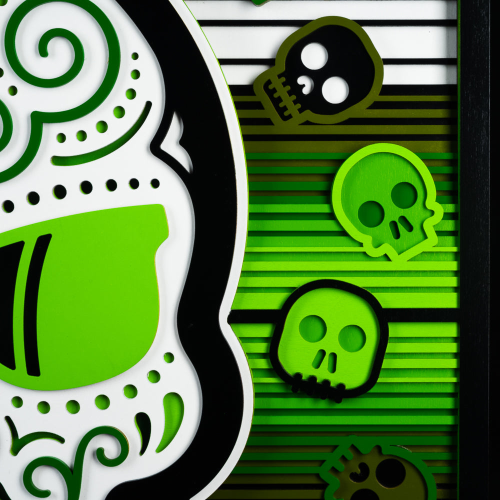 Swag x Andre Kaut wood panel artwork serape sugar skull themed in green, black and white.