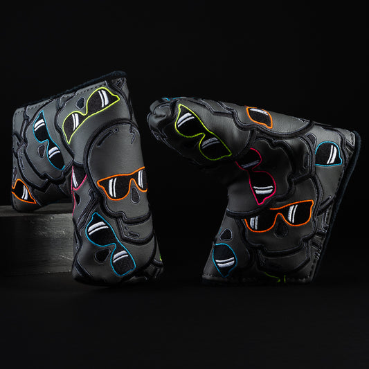 Blackout - black, pink, orange, green and blue stacked skulls blade putter golf head cover made in the USA.