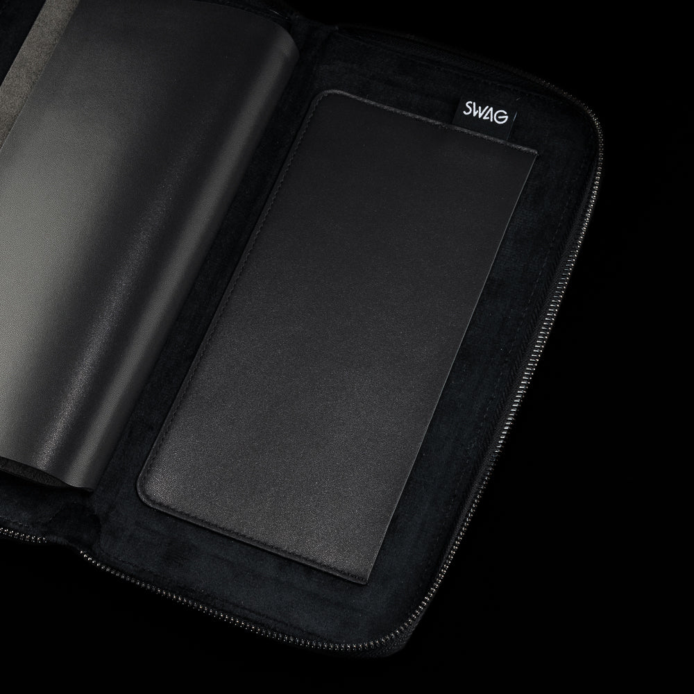 Black SWAG Golf glove folio interior with oversized storage sleeve and premium suede-lined protective construction.