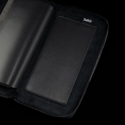 Black SWAG Golf glove folio interior with oversized storage sleeve and premium suede-lined protective construction.