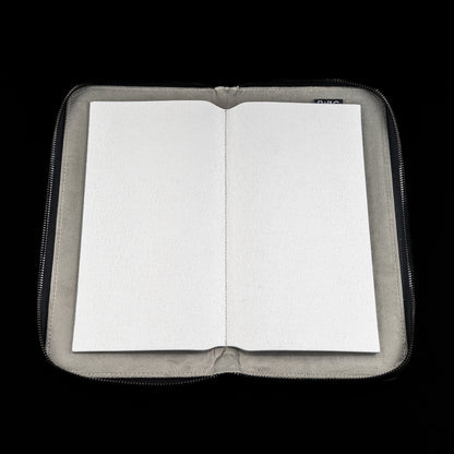 Open white SWAG Golf glove folio with soft interior lining designed to keep golf gloves flat and protected.