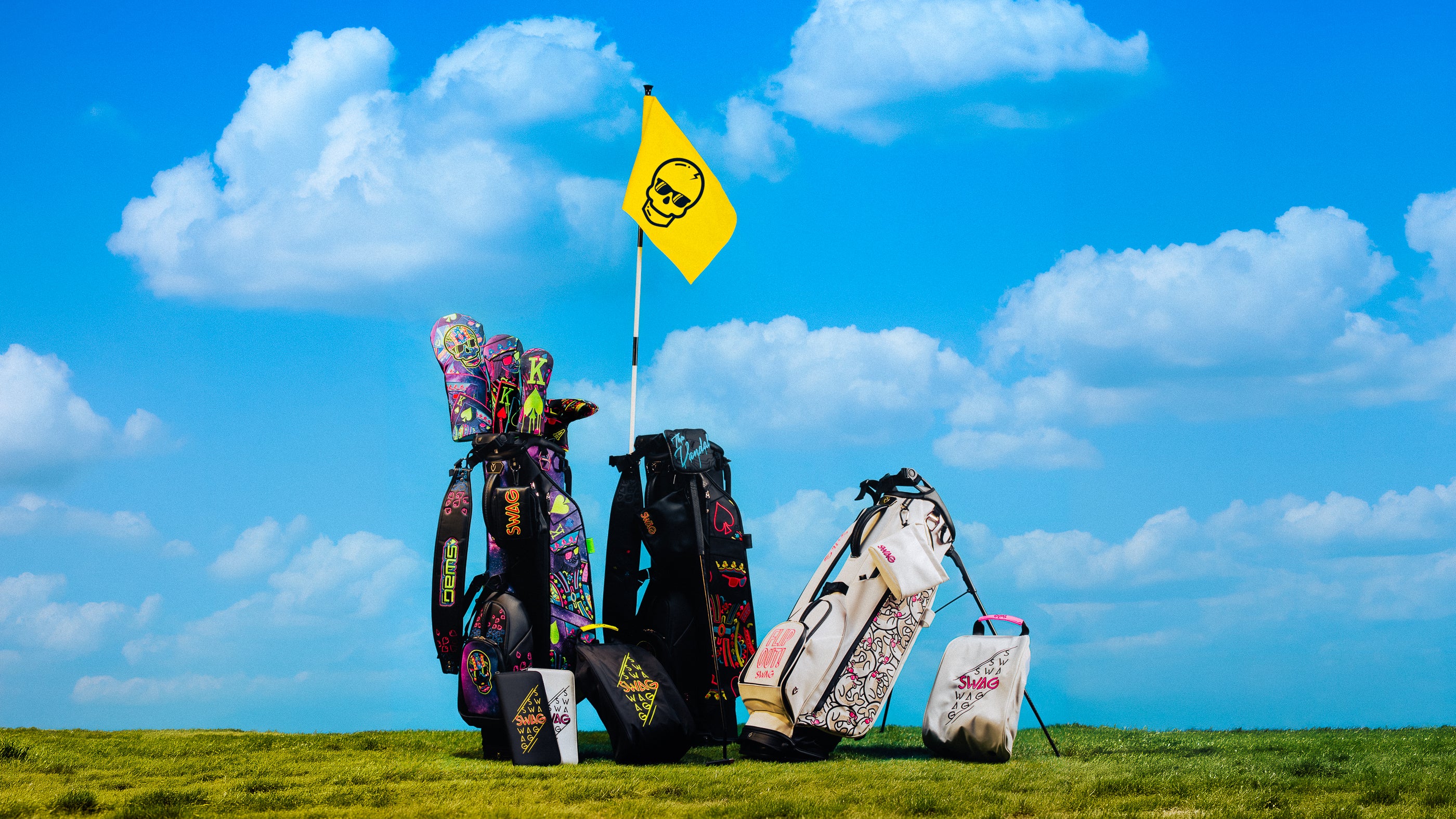SWAG Golf Summer Gear Up Collection featuring limited edition accessories. Stand bags, shoe bags, headcovers and glove holders on the course with a blue sky background.