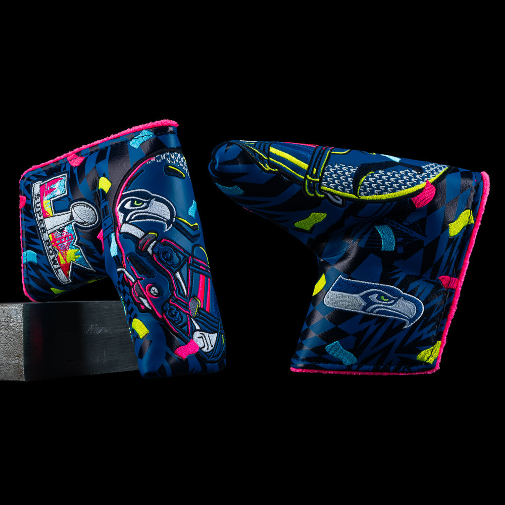 Seattle Seahawks Super Bowl LX Champions official blade golf headcover featuring a team helmet with confetti on navy material.