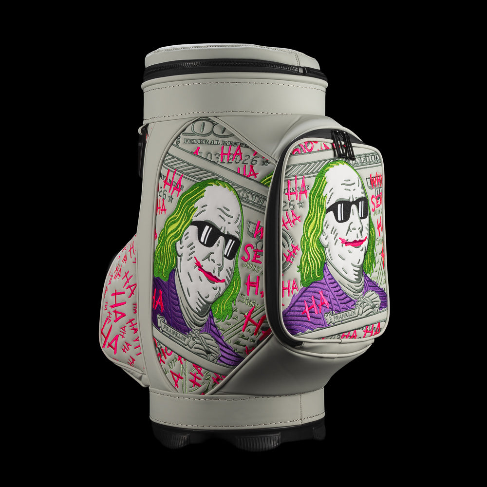 Opposite angled view of Defaced Franklin Den Caddy Cooler with green-haired portraits, black sunglasses, and purple accents.