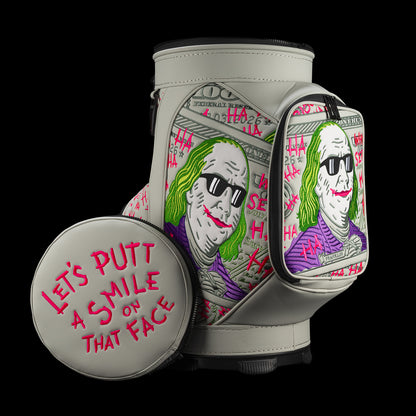 SWAG Golf Defaced Franklin Den Caddy Cooler with pale-green currency artwork, green-haired Franklin portraits, pink graffiti, and detached lid.