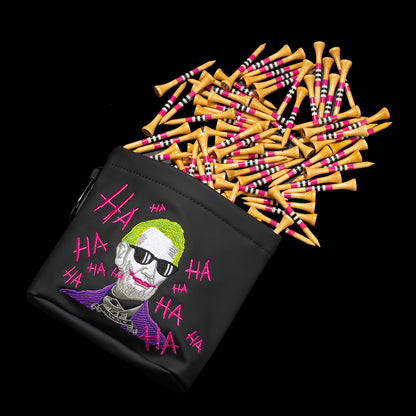 SWAG Golf black Defaced Lincoln tee pouch with green-haired Lincoln artwork, pink graffiti, and scattered striped wooden golf tees.