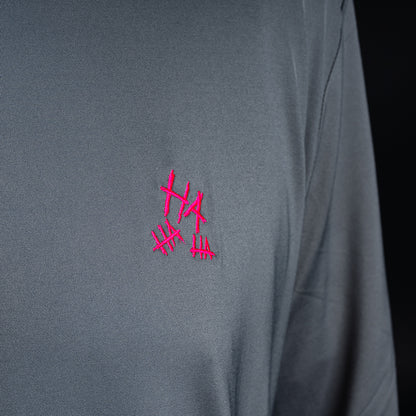 SWAG Golf gray men's long sleeve performance golf hoodie with HA HA HA embroidery over the left chest and signature neon SWAG skull over the right shoulder.