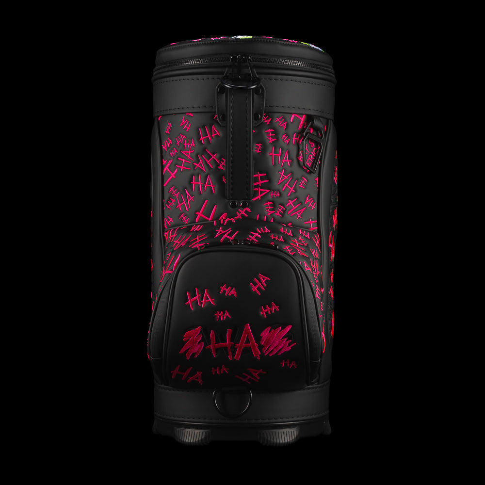Rear view of Defaced Dollar Bills Den Caddy Cooler with black carry handle, pink graffiti, and SWAG logo pocket.
