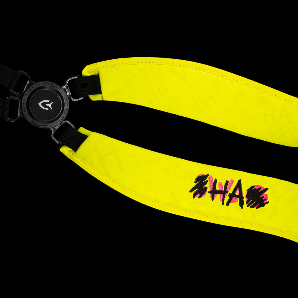 SWAG Golf x Vessel VLS Lux golf stand bag with neon yellow material and embroidered Defaced Franklin design on pink dollar bill themed panels. 