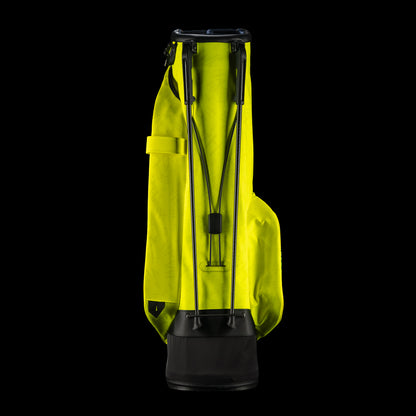 SWAG Golf x Vessel VLS Lux golf stand bag with neon yellow material and embroidered Defaced Franklin design on pink dollar bill themed panels. 