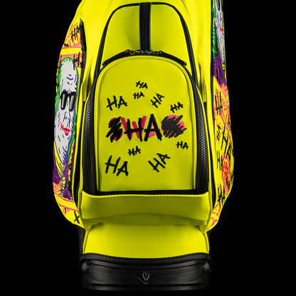 SWAG Golf x Vessel VLS Lux golf stand bag with neon yellow material and embroidered Defaced Franklin design on pink dollar bill themed panels. 