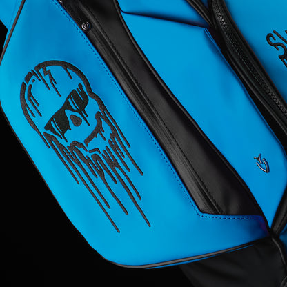 Blue and black SWAg Golf x Vessel golf stand bag with 'Don't Give a Putt' and 'Swag' text on a black background