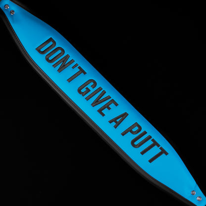 Blue and black SWAg Golf x Vessel golf stand bag with 'Don't Give a Putt' and 'Swag' text on a black background