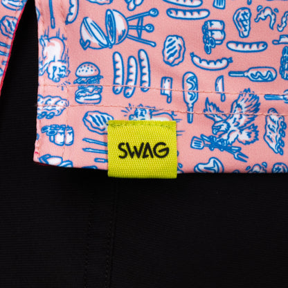 SWAG Golf Backyard BBQ Classic Polo hem detail with signature SWAG woven tag and all-over backyard barbecue print