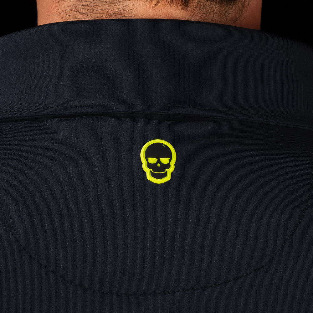 SWAG Golf Black Skull Classic Polo back collar detail featuring signature neon skull logo on black performance fabric