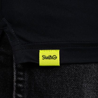 SWAG Golf Black Skull Classic Polo hem detail with signature SWAG woven tag on performance golf shirt