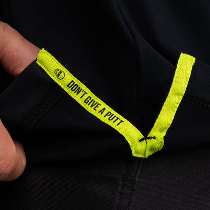 Interior detail of SWAG Golf Black Skull Classic Polo featuring signature Don't Give A Putt embroidery tape