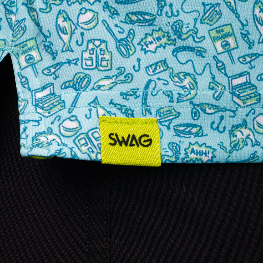 SWAG Golf Gone Fishing Classic Polo hem detail with signature SWAG woven tag and custom fishing-themed print