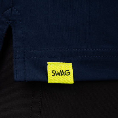 SWAG Golf Navy Aces Classic Polo hem detail with signature SWAG woven tag on performance golf shirt