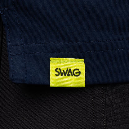 SWAG Golf Navy Flipper Classic Polo hem detail with signature SWAG woven tag on performance golf shirt