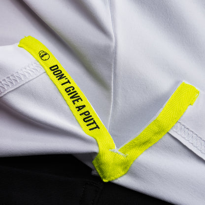 Interior detail of SWAG Golf White King Classic Polo featuring signature Don't Give A Putt text