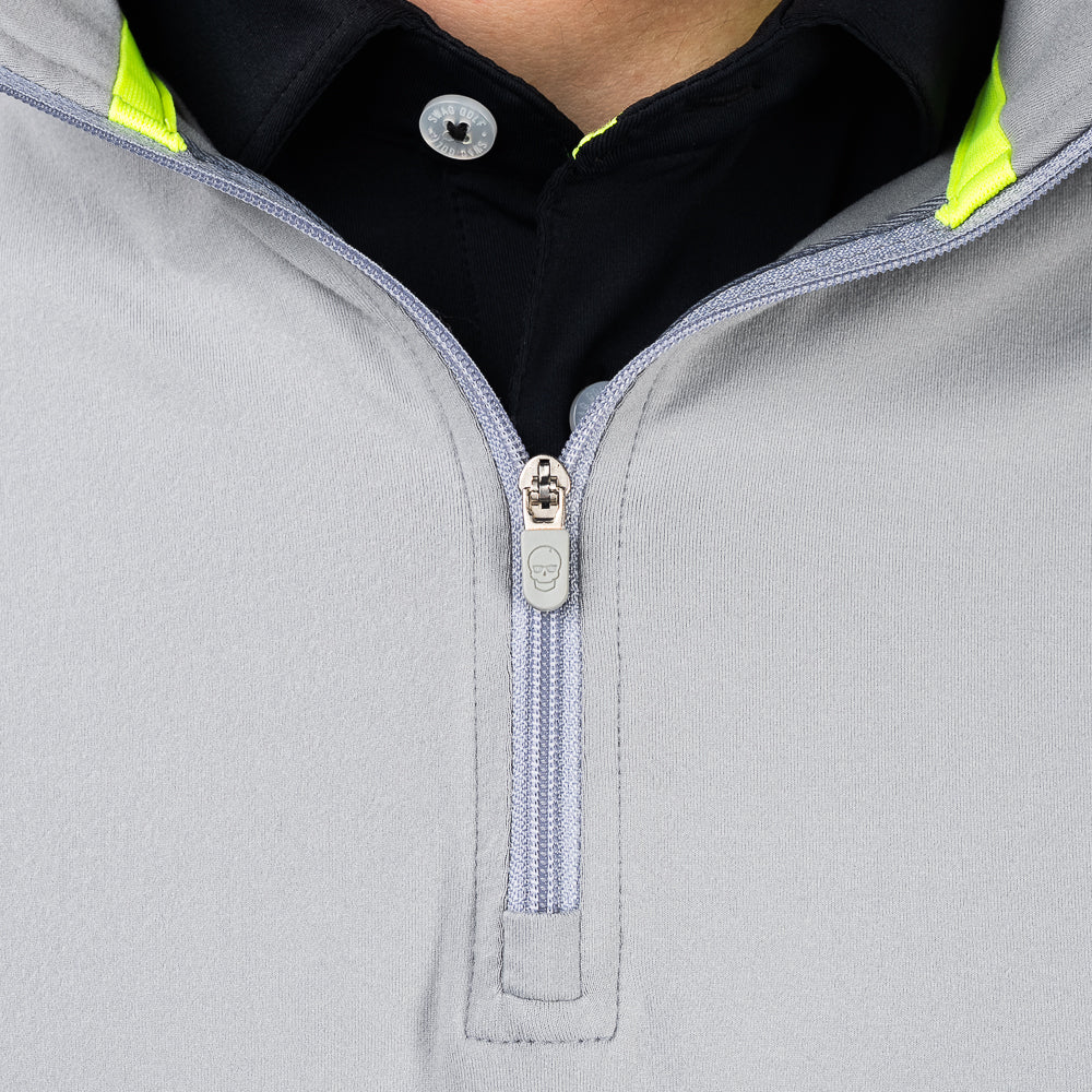 SWAG Golf Gray Club Quarter-Zip zipper detail featuring engraved skull zipper pull on performance golf pullover