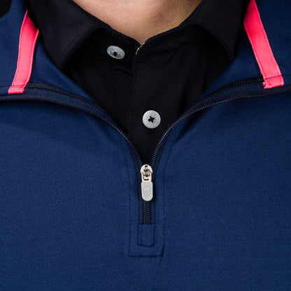 SWAG Golf Navy Club Quarter-Zip zipper detail featuring engraved skull zipper pull on performance golf pullover