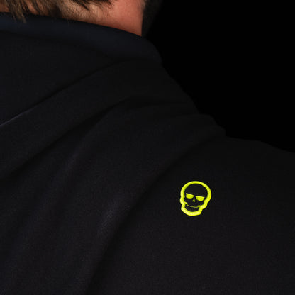 Back shoulder detail of SWAG Golf Black Lounge Hoodie featuring the signature neon skull logo
