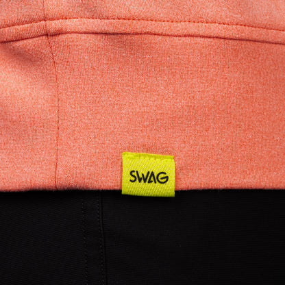 SWAG Golf Heathered Peach Lounge Hoodie hem detail featuring the signature neon SWAG woven label