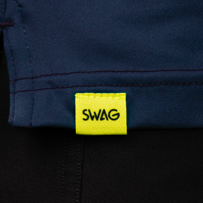 SWAG Golf Navy Player Hoodie hem detail with signature SWAG woven tag on performance golf hoodie