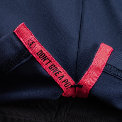 Interior detail of SWAG Golf Navy Player Hoodie featuring signature Don't Give A Putt embroidery tape