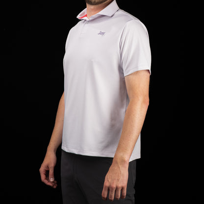 Side profile of SWAG Golf Lavender Script Tech Polo showcasing the modern athletic fit, premium stretch fabric, and minimalist design built for comfort on and off the course