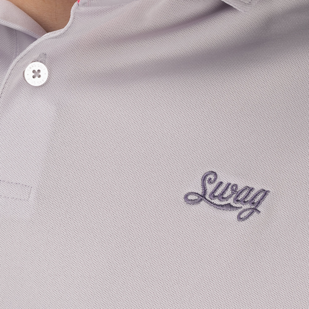 Close-up of the embroidered SWAG Script logo on the chest, highlighting the refined lavender-on-lavender design.