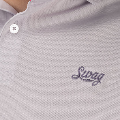 Close-up of the embroidered SWAG Script logo on the chest, highlighting the refined lavender-on-lavender design.