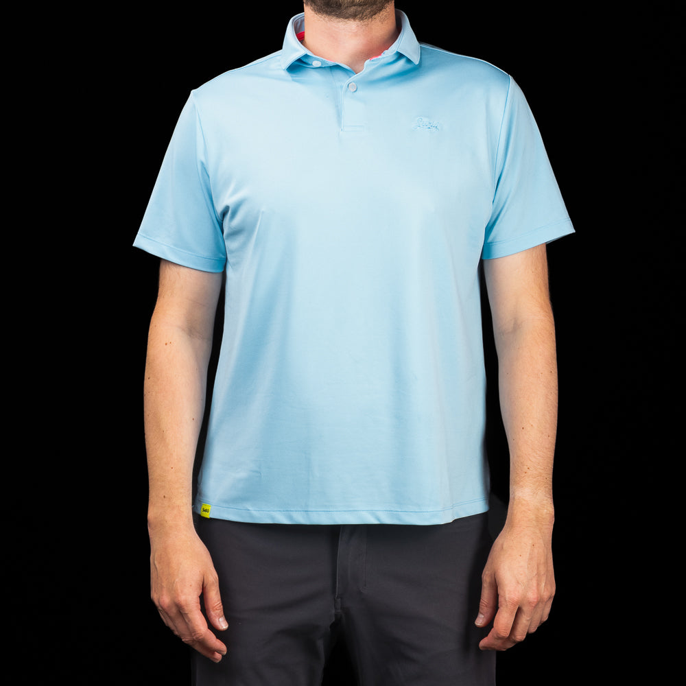 SWAG Golf Sky Blue Script Tech Polo featuring a crisp sky blue colorway, lightweight performance fabric, and tonal embroidered SWAG Script logo.